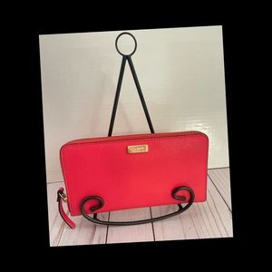 Kate Spade
Desert Rose Newbury Lane Gold Zip Around Leather Wallet